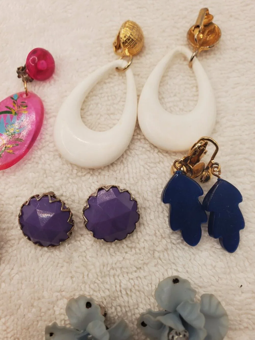12 Pair of clip on earrings, items # B-2106-2117,.  wt. 123 grams.
